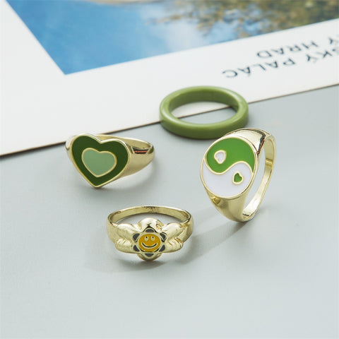 Arzonai flower smiley face ring 4-piece set European and American new trend heart-shaped metal green ring set female