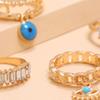Arzonai 4Pcs/Set Gold Color Evil Eye Rings For Women Vintage Boho Crystal Knuckle Ring Set Female Party Jewelry Gift