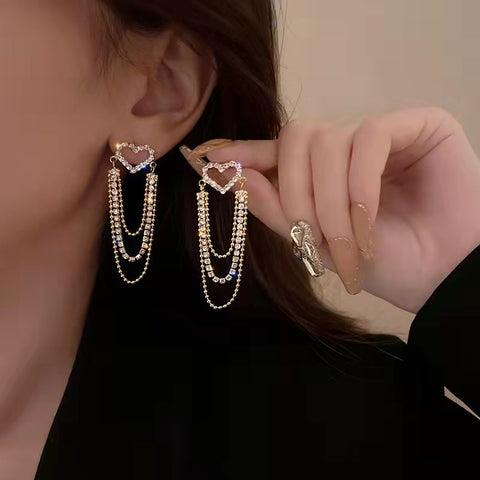 Arzonai Tassel long hollow heart earrings female niche high-end light luxury earrings 2022 new trendy earrings