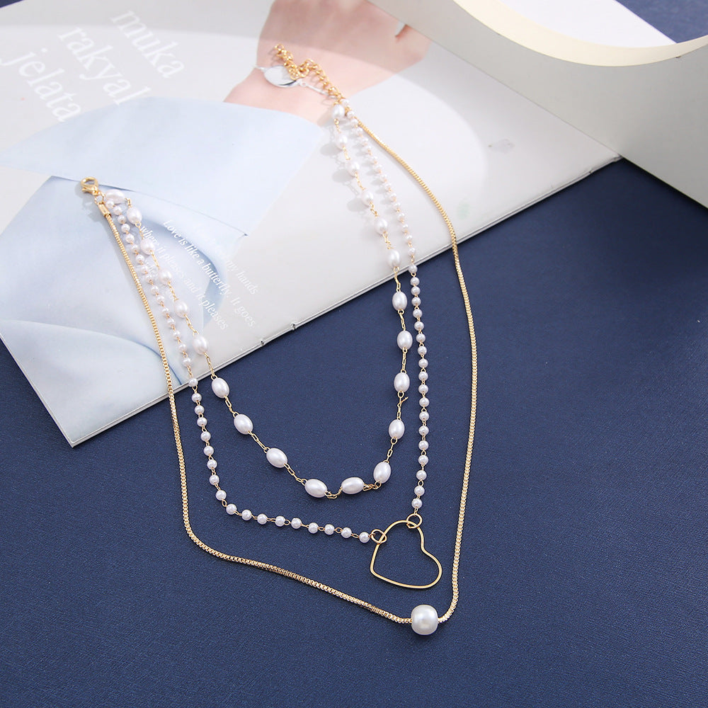 Arzonai 2022 new French European and American cross-border personality simple temperament women's multi-layer necklace pearl love three-layer necklace