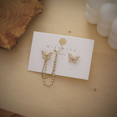 Arzonai High sense of asymmetric butterfly pearl ear bone clip earrings all-in-one female super fairy tassel earrings
