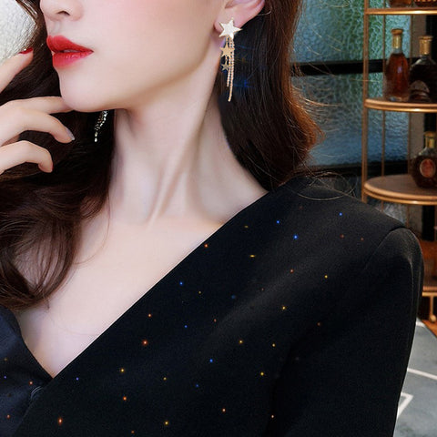 Arzonai 925 silver needle net celebrity five-pointed star tassel earrings women's high-end vibrating sonic explosion models face thin earrings temperament wholesale