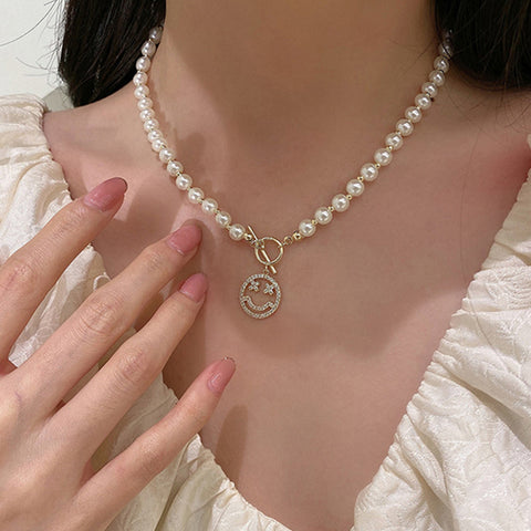 Arzonai Japan and South Korea ins new super fairy temperament imitation pearl smiley necklace cold wind sweet and simple OT buckle collarbone chain