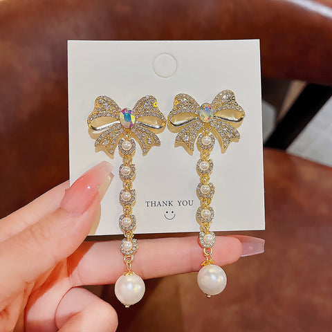 Arzonai 925 silver needle star street shooting bow tassel earrings Korean temperament net celebrity celebrity earrings exaggerated earrings female