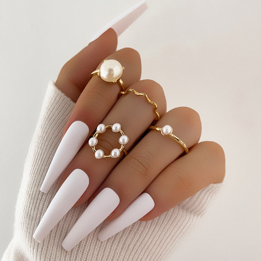 Arzonai new product temperament fashion circle pearl wave simple geometric joint ring four-piece set