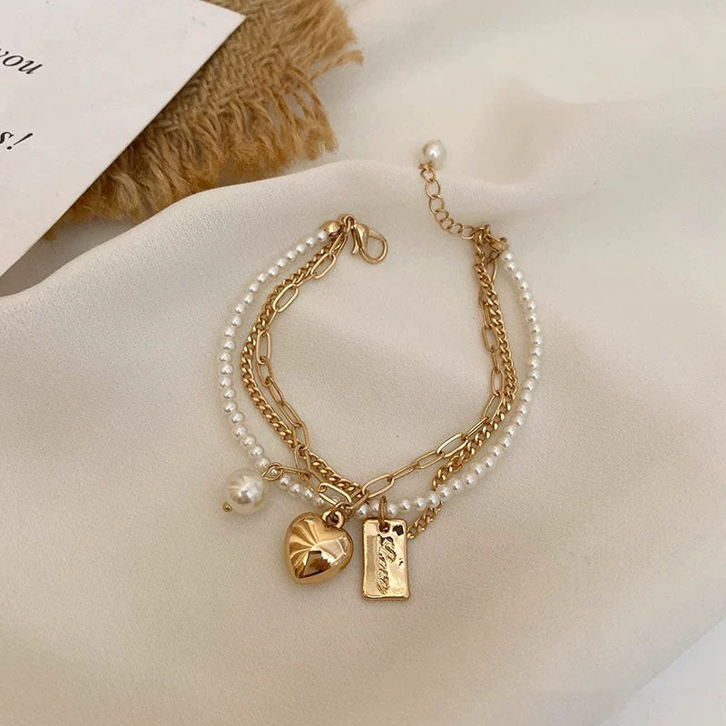 Arzonai niche design heart-shaped bracelet Korean pearl love double-layer bracelet, simple and fashionable lady's bracelet