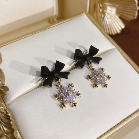 Arzonai New trendy autumn and winter women's black bow temperament earrings  Korea cold wind light luxury snowflake earrings for women and Girls