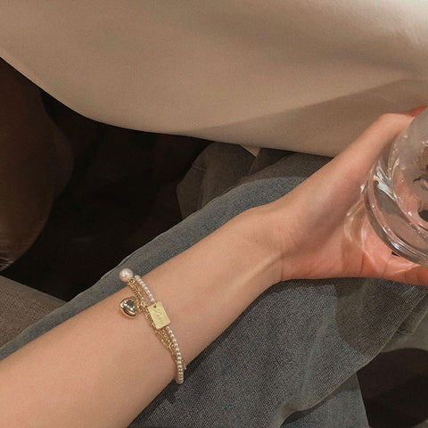 Arzonai niche design heart-shaped bracelet Korean pearl love double-layer bracelet, simple and fashionable lady's bracelet